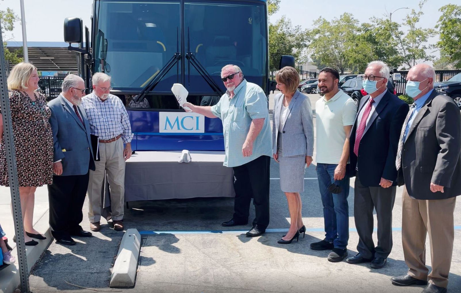 AVTA Christens New MCI Battery-Electric Commuter Coach