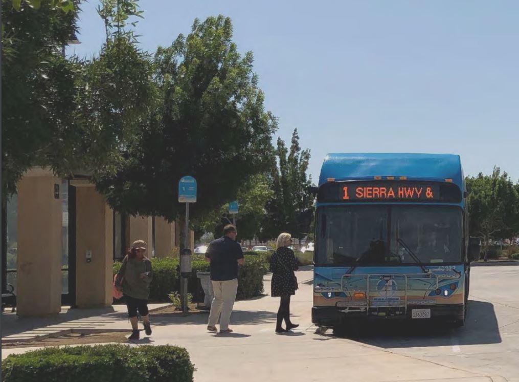 Report Cover Photo - AVTA Bus and Riders