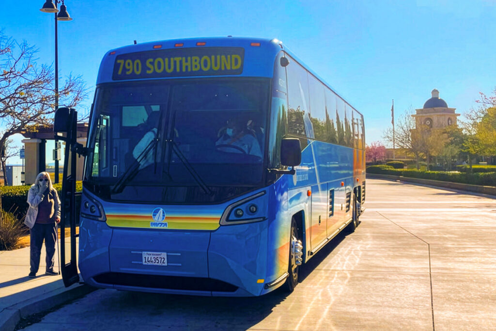 790 Southbound Bus awaiting patrons at a stop