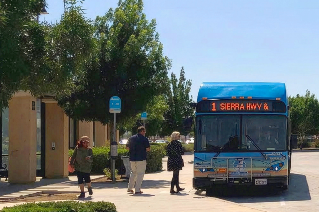Patrons Boarding Route 1 Bus