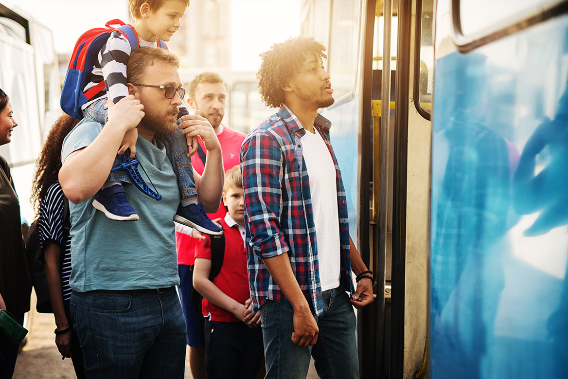 Patrons boarding a bus.
