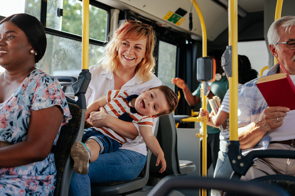 Multi-Cultural Patrons enjoying a bus ride